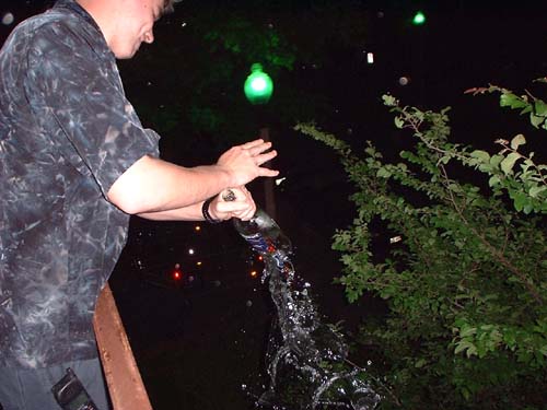 Doc breaking a Smirnoff bottle